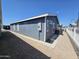 Gray home exterior with brick pavers at 650 N Hawes Rd # 3404, Mesa, AZ 85207