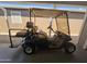 Blue golf cart parked under carport at 650 N Hawes Rd # 3404, Mesa, AZ 85207