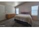 Comfortable bedroom with ample closet space and neutral decor at 650 N Hawes Rd # 3404, Mesa, AZ 85207