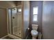 Clean bathroom with a shower stall and toilet at 650 N Hawes Rd # 3404, Mesa, AZ 85207