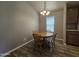 Dining area with wood table and chairs at 650 N Hawes Rd # 3404, Mesa, AZ 85207
