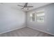 Bright office space with two windows and ceiling fan at 16172 W Alameda Rd, Surprise, AZ 85387