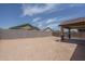 Covered patio and expansive backyard view at 16172 W Alameda Rd, Surprise, AZ 85387