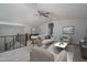 Bright loft features a ceiling fan and sitting area at 16172 W Alameda Rd, Surprise, AZ 85387