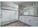 Modern bathroom with double vanity and large shower at 16172 W Alameda Rd, Surprise, AZ 85387