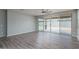 Spacious living room with sliding glass doors at 16172 W Alameda Rd, Surprise, AZ 85387