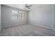 Spacious bedroom with neutral decor and ample natural light at 16172 W Alameda Rd, Surprise, AZ 85387