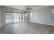 Spacious living room featuring hardwood floors and natural light at 16172 W Alameda Rd, Surprise, AZ 85387
