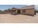 View of home's back elevation and spacious backyard at 16172 W Alameda Rd, Surprise, AZ 85387