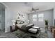 Main bedroom with wood bed frame and stylish decor at 16172 W Alameda Rd, Surprise, AZ 85387