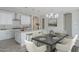 Kitchen with dining area and marble table at 16172 W Alameda Rd, Surprise, AZ 85387