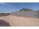 Large backyard with block wall and sandy ground at 16172 W Alameda Rd, Surprise, AZ 85387