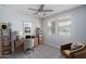 Home office with built-in shelving and seating at 16172 W Alameda Rd, Surprise, AZ 85387
