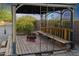 Relaxing gazebo with fire pit and wooden seating at 19950 W Cambridge Ave, Buckeye, AZ 85396