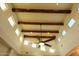 High ceiling with exposed wooden beams and recessed lighting at 19950 W Cambridge Ave, Buckeye, AZ 85396