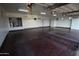 Garage with built-in storage cabinets and water heater at 19950 W Cambridge Ave, Buckeye, AZ 85396
