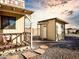 View of two charming outbuildings with rustic Western-themed decor at 19950 W Cambridge Ave, Buckeye, AZ 85396