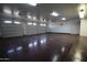 Spacious three-car garage with epoxy flooring and ample storage at 19950 W Cambridge Ave, Buckeye, AZ 85396