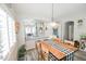 Bright dining area with a wooden table and kitchen views at 35528 N Zachary Rd, San Tan Valley, AZ 85144