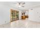 Bright dining area with sliding glass doors to backyard access at 2605 N 89Th Dr, Phoenix, AZ 85037