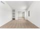 Bedroom with built-in shelving and mirrored closet at 2605 N 89Th Dr, Phoenix, AZ 85037