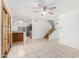 Bright living area with tile floors and kitchen view at 2605 N 89Th Dr, Phoenix, AZ 85037