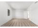 Spacious bedroom with neutral carpeting and ample natural light at 2605 N 89Th Dr, Phoenix, AZ 85037