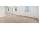 Bright bedroom with mirrored closet and neutral walls at 2605 N 89Th Dr, Phoenix, AZ 85037