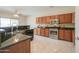 Kitchen with granite countertops and stainless steel appliances at 1121 E Jahns Dr, Casa Grande, AZ 85122