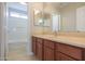 Clean bathroom with wood cabinets and a large vanity at 1121 E Jahns Dr, Casa Grande, AZ 85122
