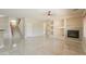 Bright living room with a fireplace and built-in shelving at 1121 E Jahns Dr, Casa Grande, AZ 85122