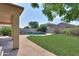 Artificial turf and flagstone surround a refreshing pool at 1121 E Jahns Dr, Casa Grande, AZ 85122
