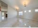 Bright and spacious living room with tile flooring and a fireplace at 1121 E Jahns Dr, Casa Grande, AZ 85122