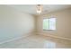 Simple bedroom with large window and ceiling fan at 1121 E Jahns Dr, Casa Grande, AZ 85122