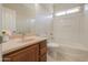 Well-lit bathroom with new vanity and tub at 1121 E Jahns Dr, Casa Grande, AZ 85122