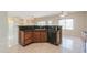 Kitchen island with granite countertops and a double sink at 1121 E Jahns Dr, Casa Grande, AZ 85122