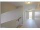 Light-filled upstairs hallway with access to bedrooms at 1121 E Jahns Dr, Casa Grande, AZ 85122