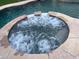 Circular hot tub with bubbling jets for ultimate relaxation at 1121 E Jahns Dr, Casa Grande, AZ 85122