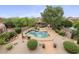 Aerial view of a large backyard oasis with a pool and landscaping at 7514 E Oasis Cir, Mesa, AZ 85207