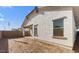 Spacious backyard with a view of the home's exterior at 7245 S 75Th Dr, Laveen, AZ 85339