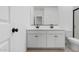 Double vanity bathroom with modern fixtures and a clean design at 7245 S 75Th Dr, Laveen, AZ 85339
