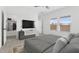 Bright bedroom with large windows, walk-in closet, and plush bedding at 7245 S 75Th Dr, Laveen, AZ 85339
