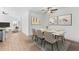 Bright dining area with a marble table and six chairs at 7245 S 75Th Dr, Laveen, AZ 85339