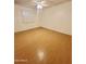 Well-lit bedroom, featuring wood-look floors and window shutters at 1942 S Emerson -- # 154, Mesa, AZ 85210