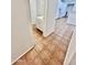 Clean hallway with tile floors and access to bathroom and kitchen at 1942 S Emerson -- # 154, Mesa, AZ 85210