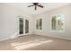 Spacious bedroom with neutral carpeting and french doors at 4213 E Edgemont Ave, Phoenix, AZ 85008