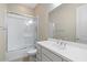 Clean bathroom featuring a tub, shower, and vanity at 25807 N 19Th Gln, Phoenix, AZ 85085
