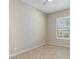 Well-lit bedroom with tile flooring and a large window at 25807 N 19Th Gln, Phoenix, AZ 85085