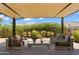 Covered patio with seating area, perfect for outdoor relaxation at 25807 N 19Th Gln, Phoenix, AZ 85085