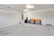 Attached garage with built-in shelving and storage at 25807 N 19Th Gln, Phoenix, AZ 85085